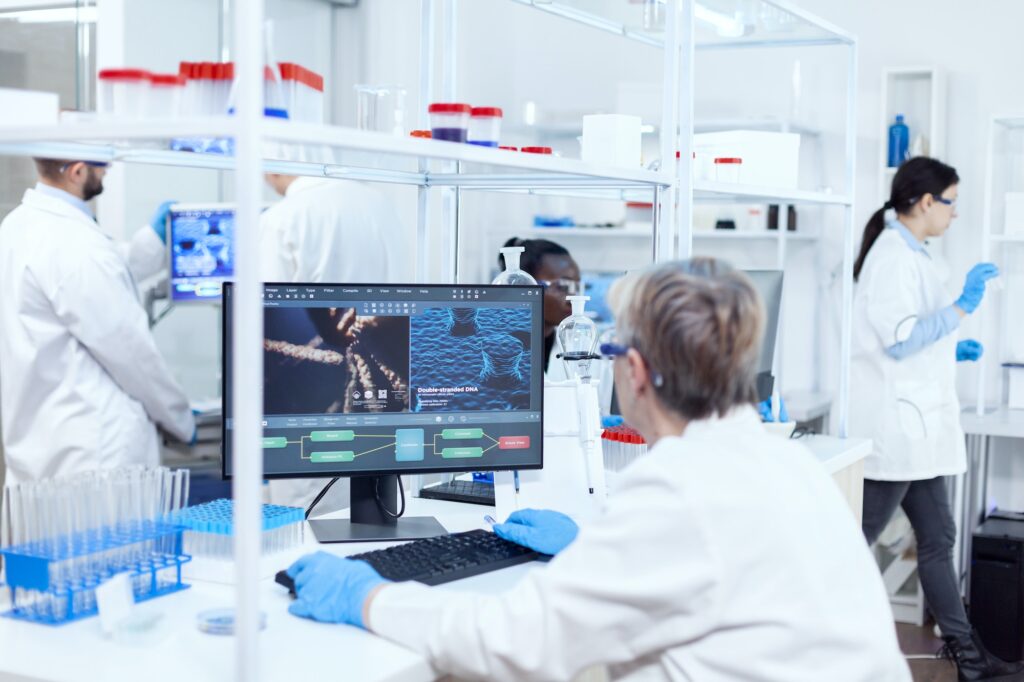 Senior scientist in pharmaceuticals laboratory doing genetic research